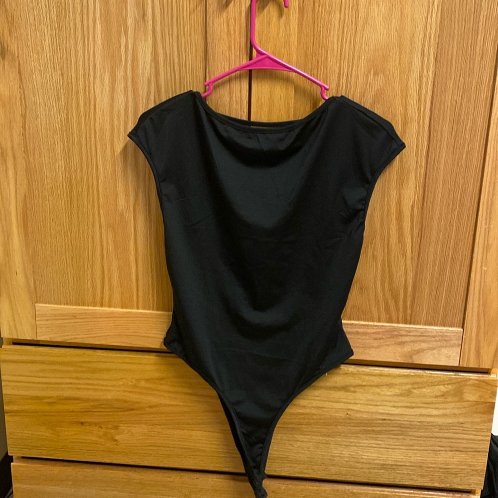 black body suit with open back